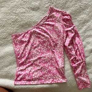 Cute off the shoulder top bought from a boutique. Has cuff look at end of sleeve